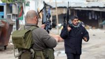 Combatientes en Bab Attebaneh