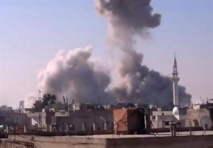 El humo de los combates en Homs, Siria El humo de los combates en Homs, Siria