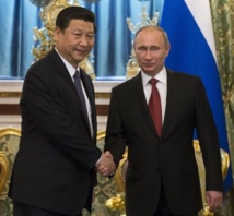 Xi Jinping-izquierda-y Vladimir Putin