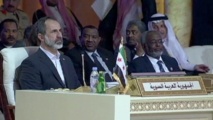 Ahmad Moad Al Jatib, ocupando el asiento de Siria