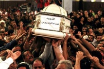El funeral de uno de los cristianos asesinados