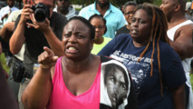 Manifestantes pidiendo justicia para Trayvon Martin