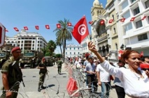 Manifestantes protestando por el asesinato de Brahmi, en Túnez. Manifestantes protestando por el asesinato de Brahmi, en Túnez.