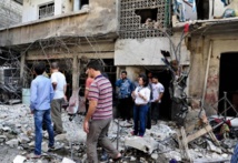 Asad reitera el compromiso de destruir su arsenal químico