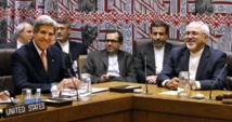 John Kerry-izquierda-y Muhamad Javad Zarif-derecha-.