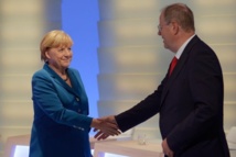 Merkel-izquierda-y Steinbrück