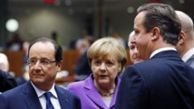 Hollande-izquierda-,Merkel-centro-y Cameron.