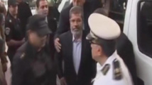 Muhammad Mursi, en el centro