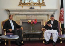 Kerry-izquierda-y Karzai Kerry-izquierda-y Karzai