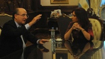 Antonio Brufau-izquierda-y Cristina Fernández, en marzo de 2012.