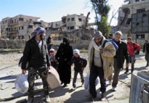 Civiles salen de la ciudad vieja de Homs Civiles salen de la ciudad vieja de Homs