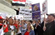 Manifestantes en contra de Al jasira, en Egipto. Manifestantes en contra de Al jasira, en Egipto.