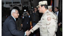 Abdul Fatah As Sisi-a la izquierda-.