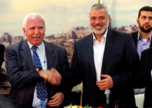 Assam Al Ahmad, de Fatah, a la izquierda, y Ismail Haniya, de Hamas.