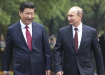 Xi Jinping-a la izquierda-y Vladimir Putin, en China