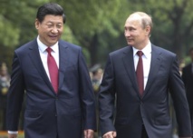 Xi Jinping-a la izquierda-y Vladimir Putin, en China Xi Jinping-a la izquierda-y Vladimir Putin, en China