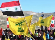 Una simpatizante del partido ondea una bandera siria Una simpatizante del partido ondea una bandera siria