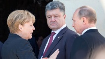 De izquierda a derecha, Merkel, Poroshenko y Putin De izquierda a derecha, Merkel, Poroshenko y Putin
