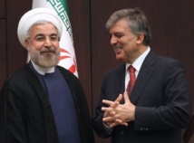 Rohani-izquierda-y Gul. Rohani-izquierda-y Gul.