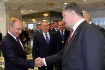 Putin-izquierda-y Poroshenko