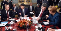 De izquierda a derecha, Putin, Renzi, Poroshenko y Merkel, la semana pasada en Milán. De izquierda a derecha, Putin, Renzi, Poroshenko y Merkel, la semana pasada en Milán.