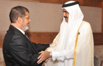 Muhammad Mursi y Hamad bin Jalifa Al Thani