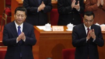 Xi Jinping-a la izquierda-y Li Keqiang