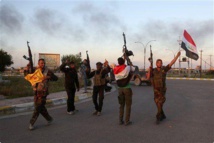 Soldados y milicianos iraquíes celebran la victoria en el centro de Tikrit Soldados y milicianos iraquíes celebran la victoria en el centro de Tikrit