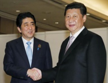 Abe-a la izquierda-y Xi