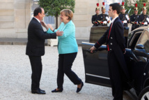 Hollande-izquierda-y Merkel Hollande-izquierda-y Merkel