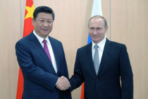 El presidente chino, Xi-a la izquierda-y el ruso, Putin