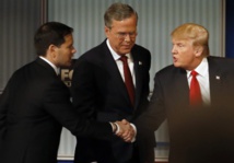 Los candidatos republicanos Marco Rubio-a la izquierda-Jeb Bush-al centro-y Donald Trump