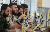 Zahran Alush-segundo por la izquierda-en 2014 en Duma, cerca de Damasco. Zahran Alush-segundo por la izquierda-en 2014 en Duma, cerca de Damasco.