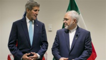 John Kerry-a la izquierda-y Muhamad Javad Zarif