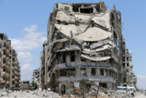 Un edificio dañado en Homs Un edificio dañado en Homs