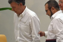 El presidente de Colombia, Santos-a la izquierda-y el líder de las FARC, Timochenko El presidente de Colombia, Santos-a la izquierda-y el líder de las FARC, Timochenko