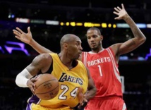 Kobe Bryant, a la izquierda Kobe Bryant, a la izquierda