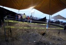 Exhumados quince de 116 cadáveres de fosa cavada por autoridad mexicana