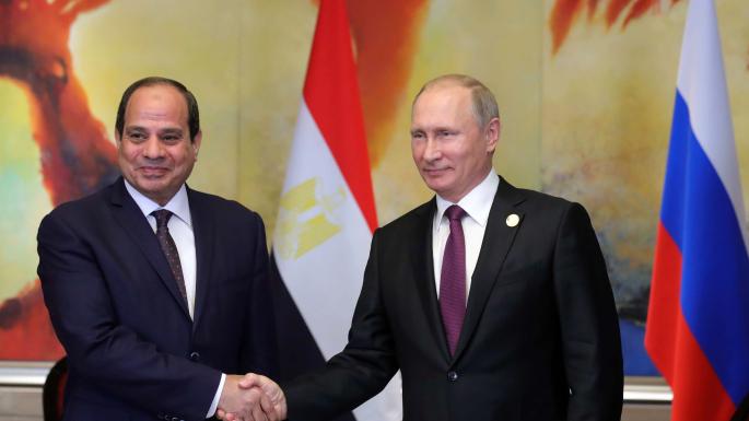 El presidente egipcio As Sisi-a la izquierda-y el presidente ruso Putin.