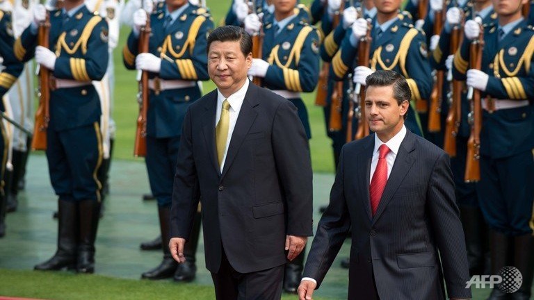 Los presidentes de China, Xi-a la izquierda-y de México, Peña Nieto.