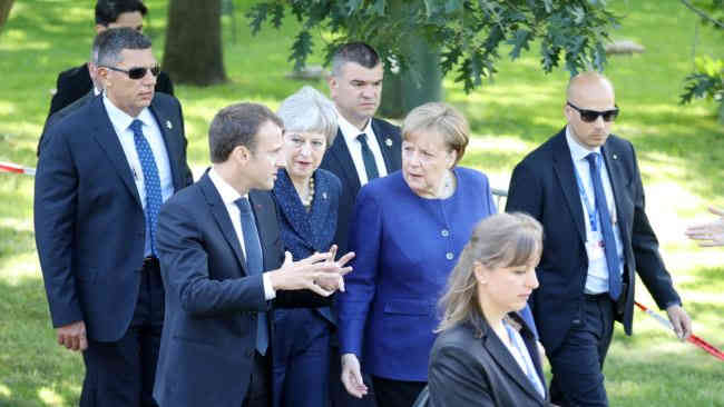 Macron, May y Merkel