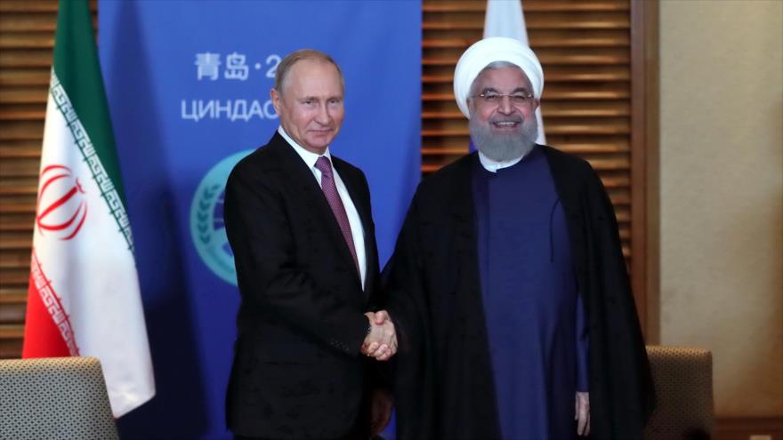 Putin-a la izquierda-y Rohani Putin-a la izquierda-y Rohani