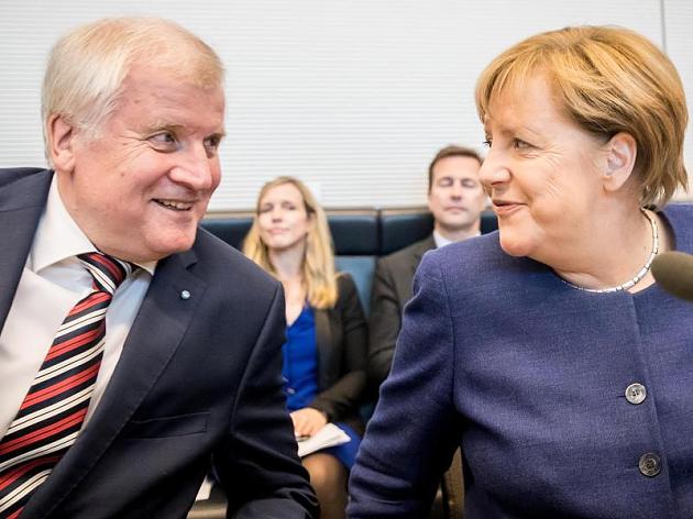 Horst Seehofer y Angela Merkel