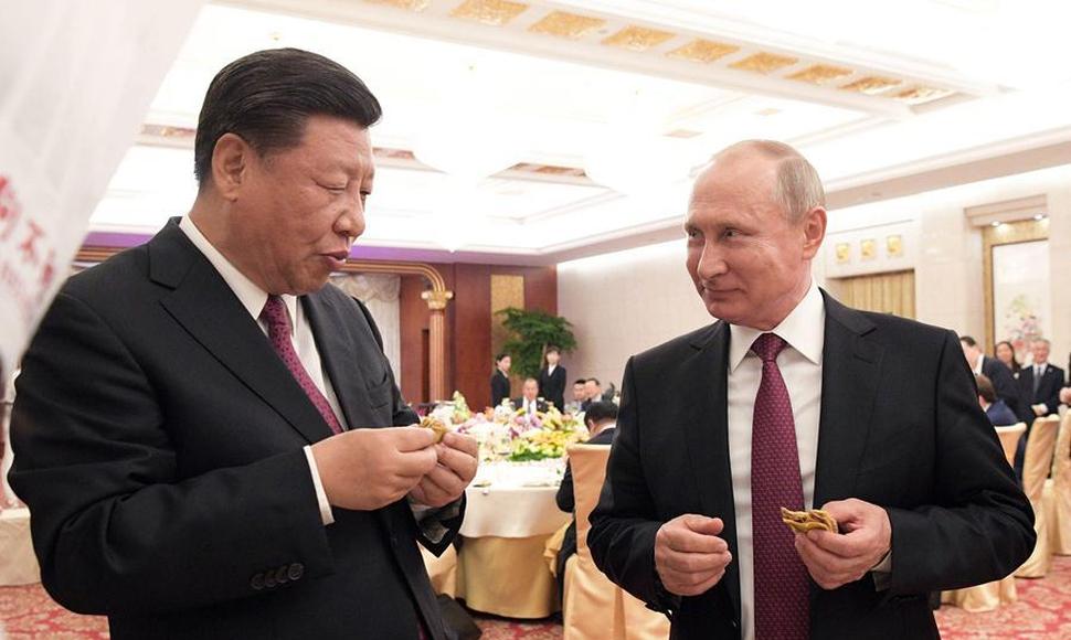 El presidente chino, Xi, a la izquierda, y el ruso, Putin.