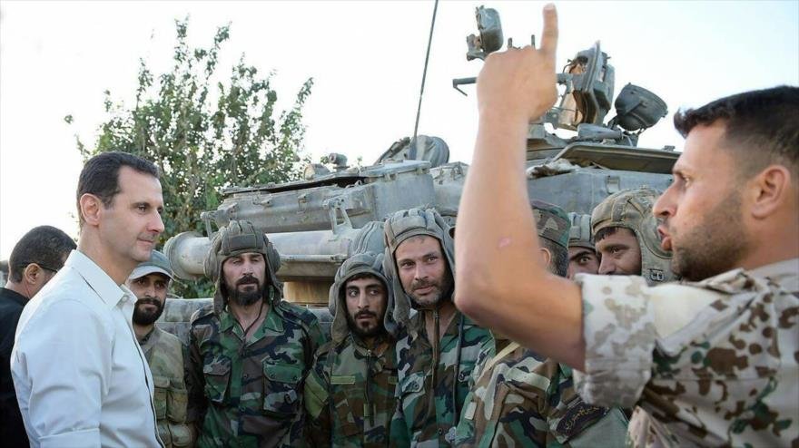 Bashar Al Asad visitando a soldados del ejército