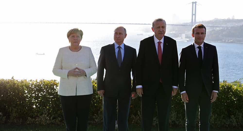 De izquierda a derecha, Merkel, Putin, Erdogan y Macron