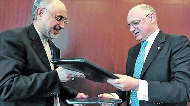 Los ministros de exteriores de Irán-izquierda-y Argentina, en enero de 2013, cuando firmaron el acuerdo