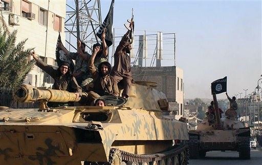Miembros del estado islámico en Raqa, al este de Siria