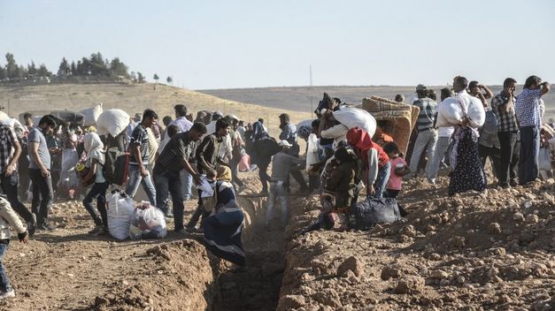 Kurdos huyendo a Turquía Kurdos huyendo a Turquía