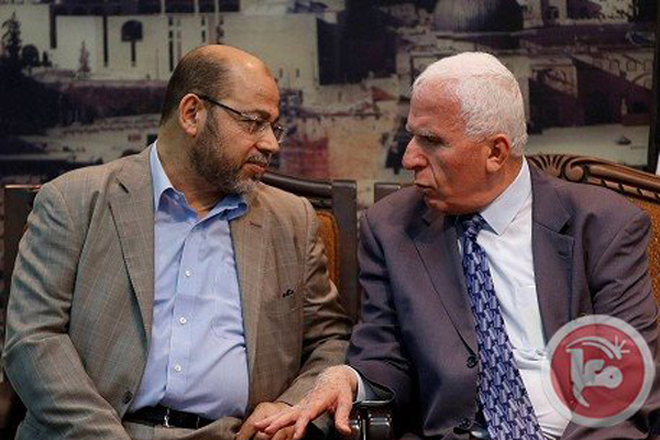 Los representantes de Hamas, Abu Marsuq-izquierda-y de Fatah, Asam Al Ahmad